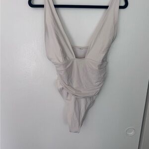 Elegant Cream Women's Bodysuit